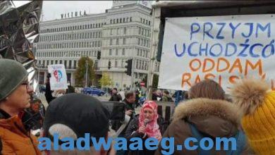 صورة مظاهرة في بولندا احتجاجا على قسوة تعامل الحكومة مع المهاجرين القادمين من بيلاروس